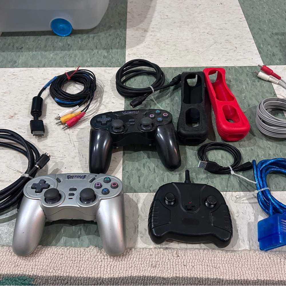 Silver and Black Game Controllers
